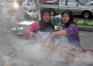 Grilling chicken at Phuket Halal Expo