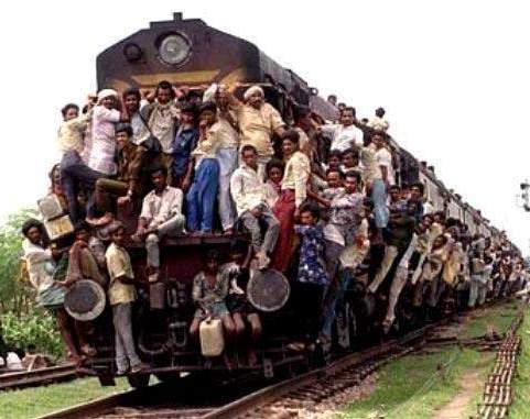 Image: http://1.bp.blogspot.com/_BfflSH3V_ck/TOU4VtaVCbI/AAAAAAAADrM/oWNeDPAs4Nc/s1600/overloaded_train_hanging_india.jpg