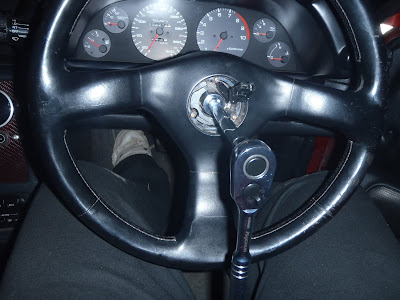Socket Wrench to Unbolt Steering Wheel