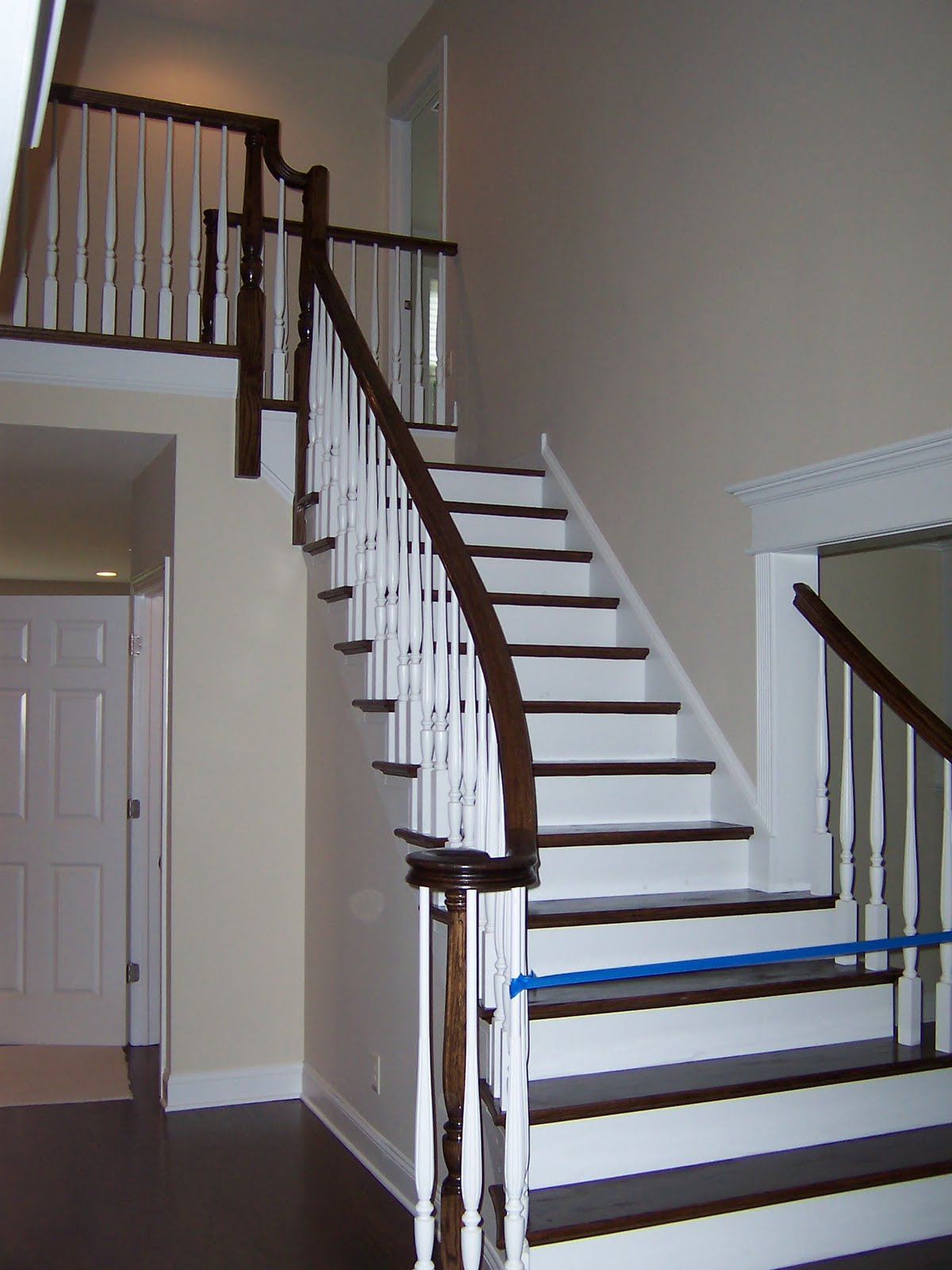 Wood Stairs and Rails and Iron Balusters Flared Oak Stair Treads and