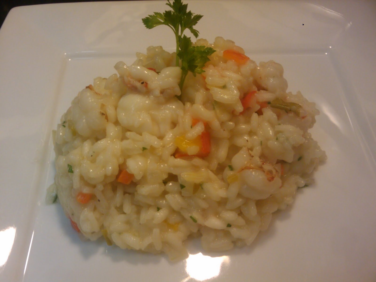 Fresh Rick's Awesome Food from Home Rock Shrimp and Lobster Risotto topped with Shredded