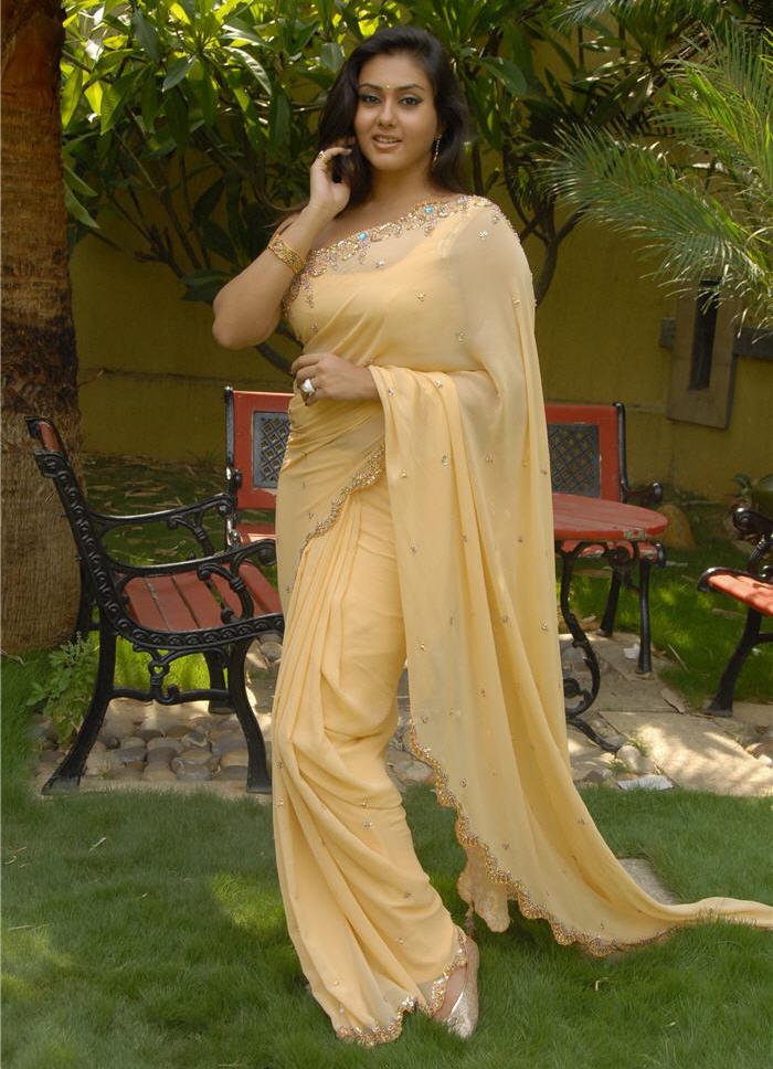 Namitha sexy in Transparent yellow