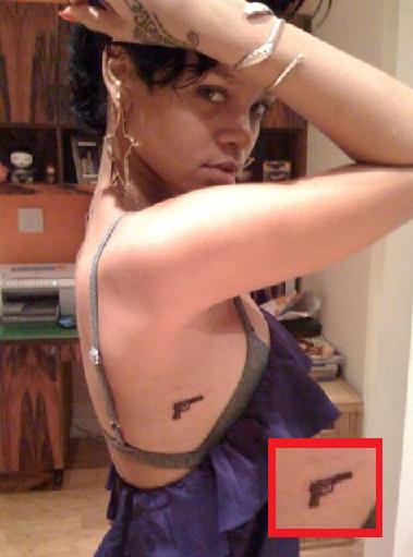 rihanna tattoo. Look at her here, she is getting a tattoo on her finger for 