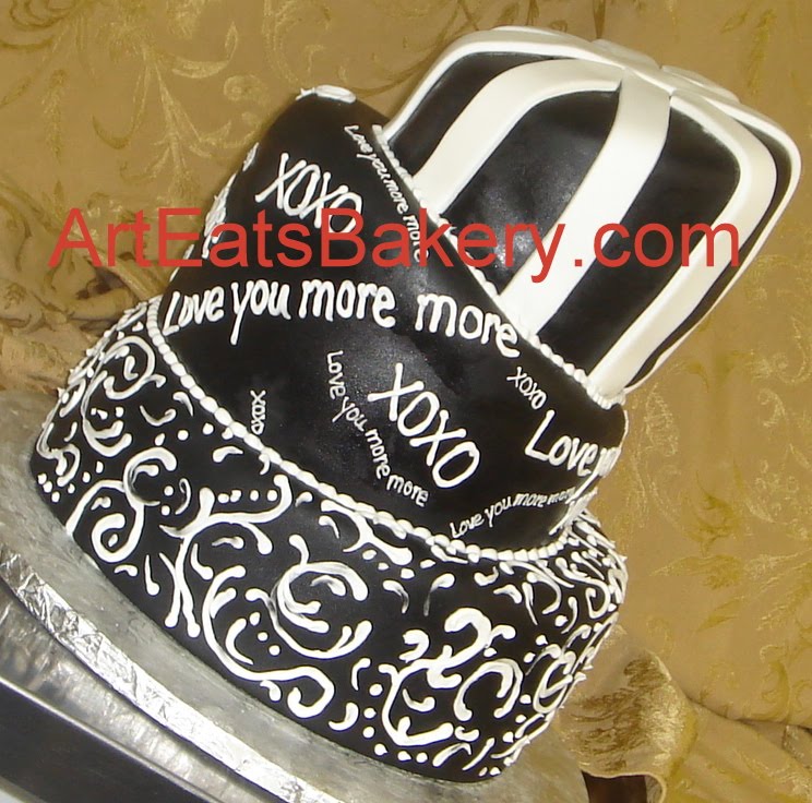 Black fondant mad topsy turvy custom wedding cake with white stripes Black fondant mad topsy turvy custom wedding cake with white stripes