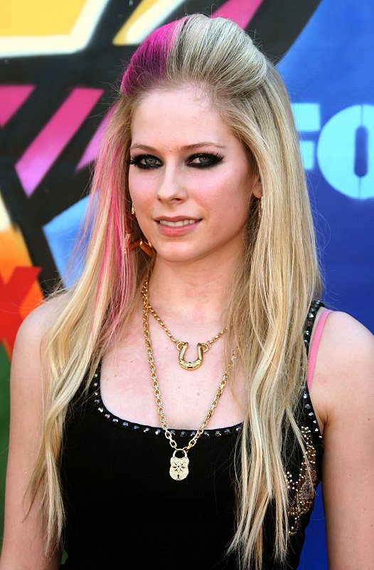 But what we don't get to see often is Avril Lavigne with no eyeliner,