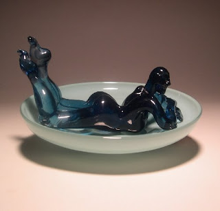 glass woman in a bowl