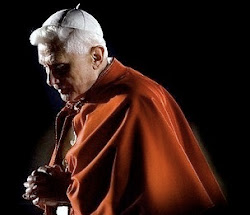 Pope Benedict XVI praying