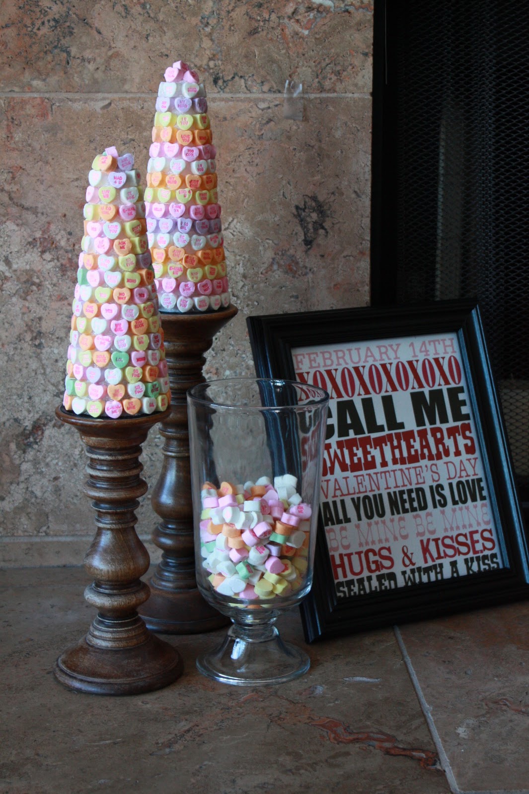 Love these candy topiaries using conversation heart for valentine's. It's perfect for Valentine's candy decor! 