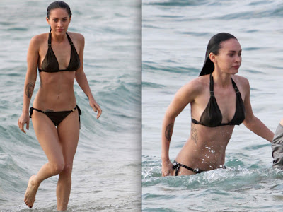 n May 2010, Megan Fox showed off her 6-pack and multiple tattoos while she