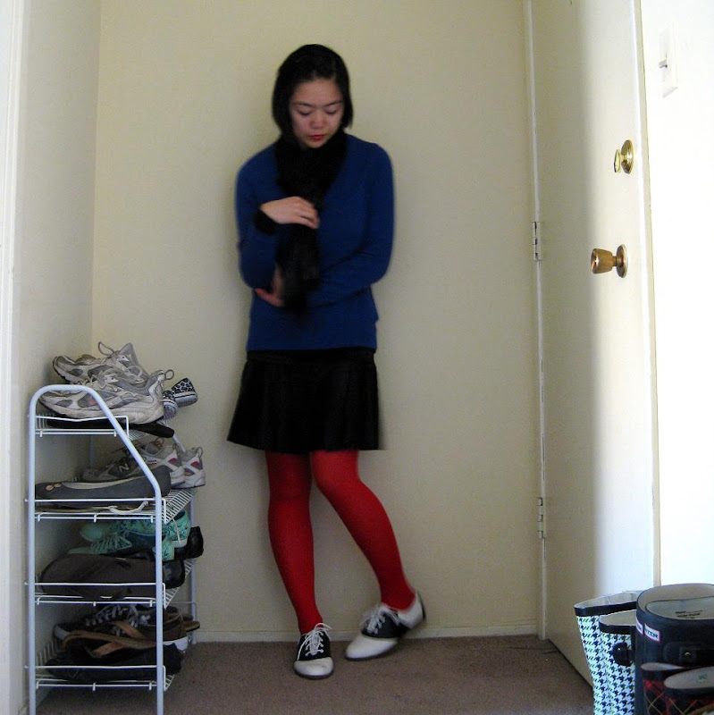 bright red tights, royal blue sweater, black and white saddle shoes