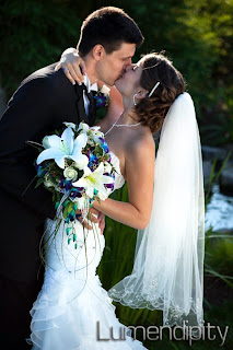 picture of beautiful couple groom and bride kissing