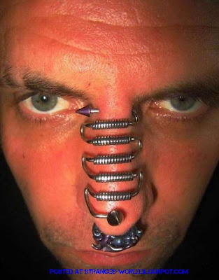 Horrible body piercing @ strange world