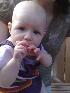 baby eating watermelon