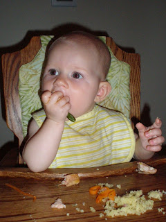 baby eating salmon