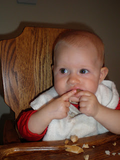 baby eating pineapple