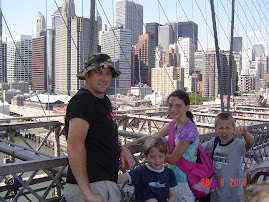 Conrad, Hen, Charlotte and Justin on Brooklyn Bridge looking back at downtown Manhattan