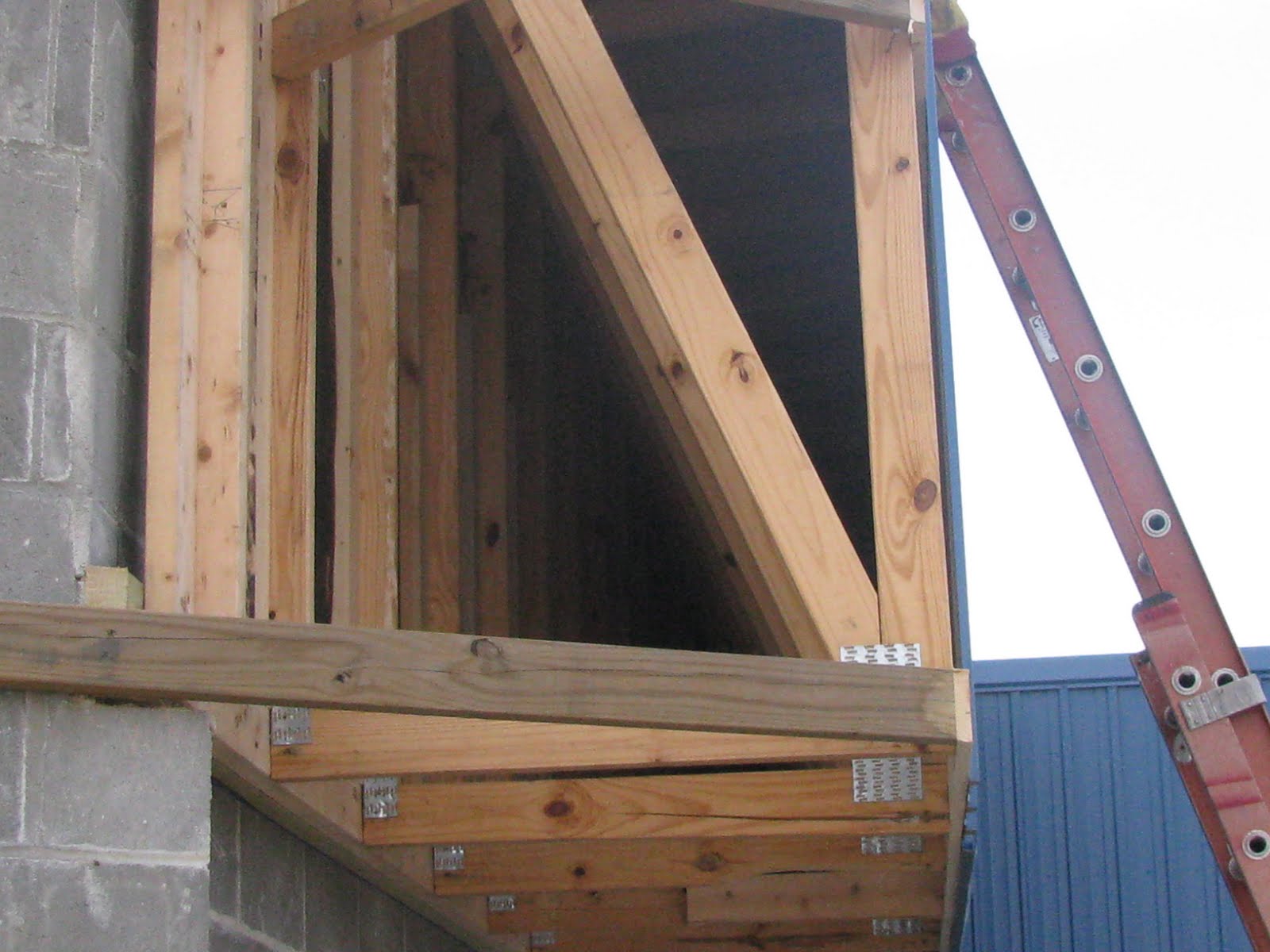 Overhangs, Concealed Spaces, Facades Firefighter's Enemy