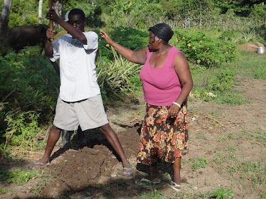 Pastor Wiljean helps to dig a trench (against Madame Wiljean's wishes)