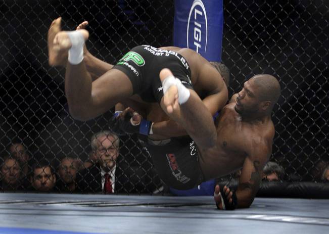 The fighters, Rashad Evans and Quinton "Rampage" Jackson fought f...