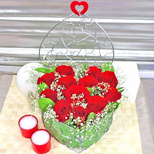 12 Red Roses with Heart Shape Metal Wired Container @ $98...