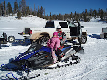 Mommy and Kaymin taking a ride in the first snowfall of the year.