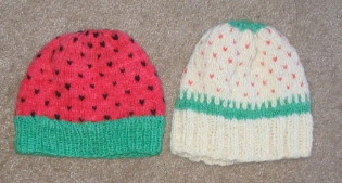 2 hand spun hand knitted caps dyed with Easter egg dyes.