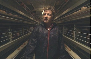 Jamie Oliver in a 'clean' battery cage shed