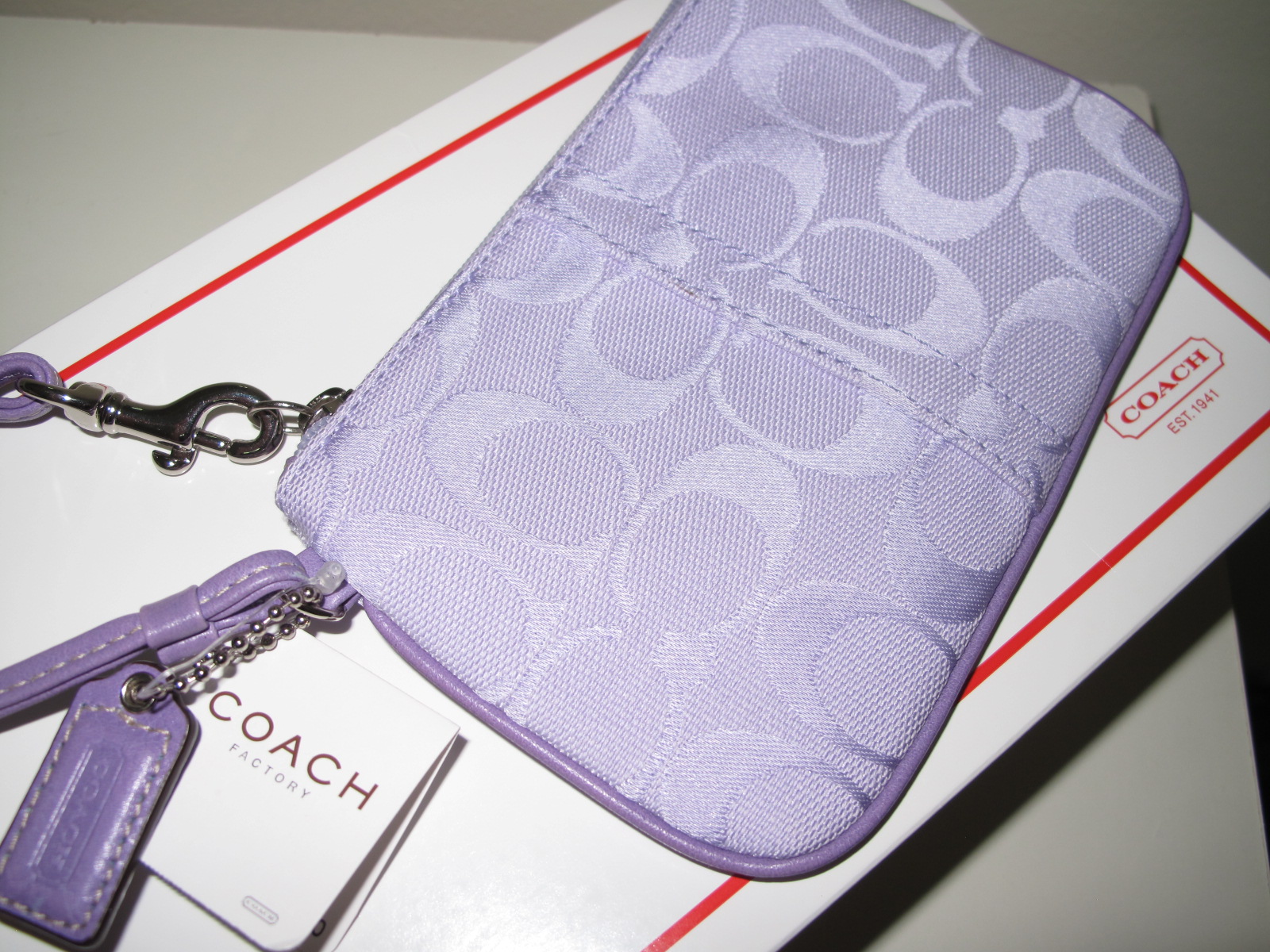 oh you pretty things: COACH SIGNATURE WRISTLET LIGHT PURPLE