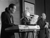 a female Guest Singer accompanied by Jason Geh Live Band