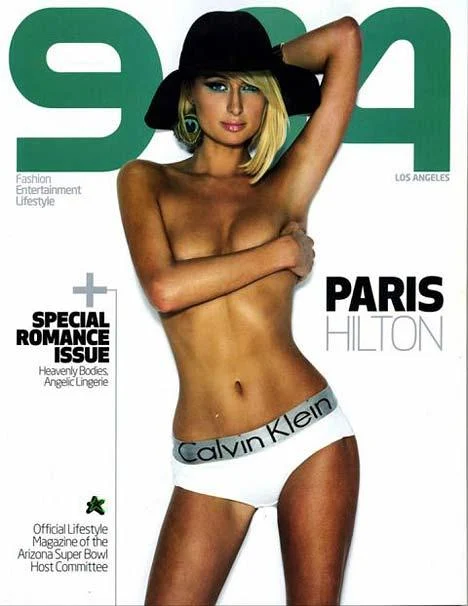 A topless Paris poses for the latest issue of 944
