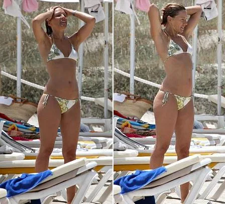 Simone Lambe sporting a skimpy floral-printed bikini