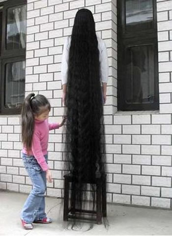 மிகப்பெரிய முடி உள்ளவர்கள்  Woman-long-hair