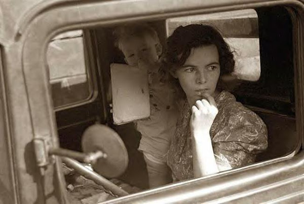 Farmer's wife in truck, Oskaloosas, Kansas, 1938