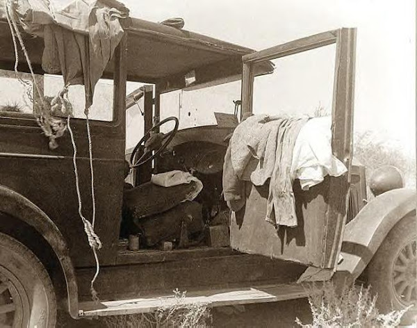 Depression family of 9. Their car, 1936