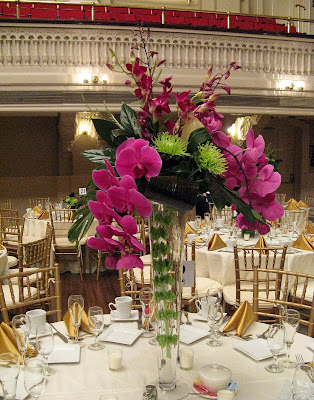 You may have noticed a large size distinction between the tall centerpieces 