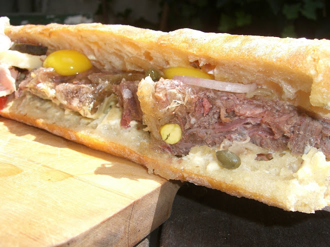Shredded beef cheeks, mayo and mustard, capers, a sliver of red onion, 2 raw eggs