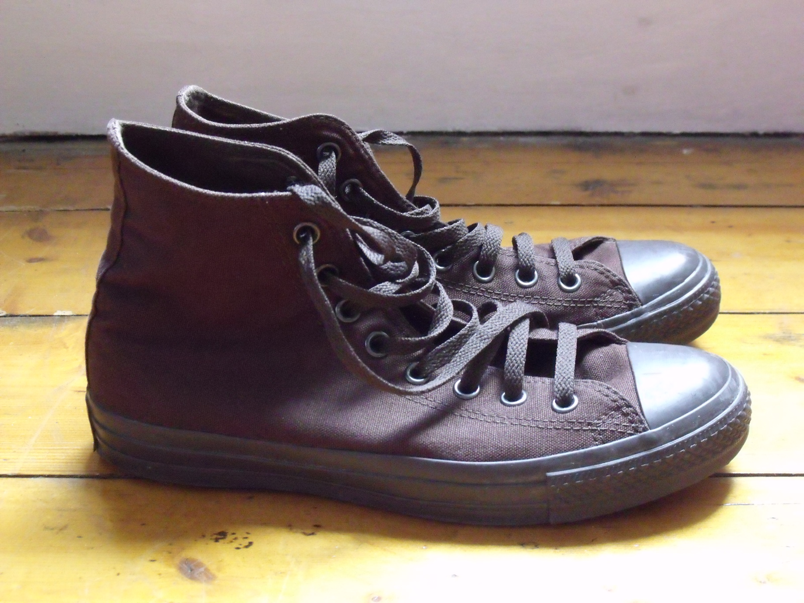 cycling in heels Converse high top plimsoles