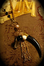 Magic Eye: Antique rosary beads, black coral, lumerian quartz, Howlite.