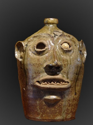 a slave-made face jug, circa 1860's. I think I've heard potters from at