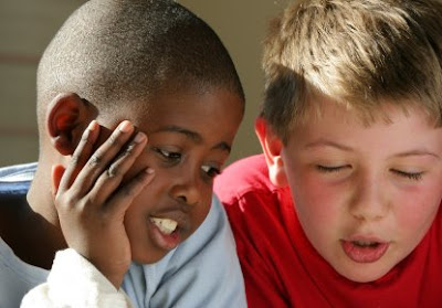 peaceful solutions to bullying NAMC montessori classroom two boys talking