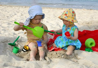 NAMC Montessori toddler classroom biting causes redirecting behavior toddlers playing in sand