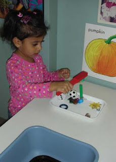 NAMC introduction to the montessori preschool classroom new montessori parents girl working alone