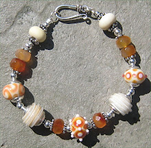 Amber and Ivory Lampwork with Faceted Carnelian