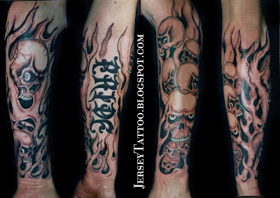 Skull And Flame Sleeve Tattoos