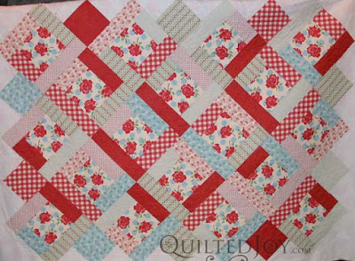 Stripey dotted roses quilt, quilted by Angela Huffman