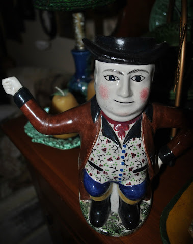 This Staffordshire toby had a broken arm
