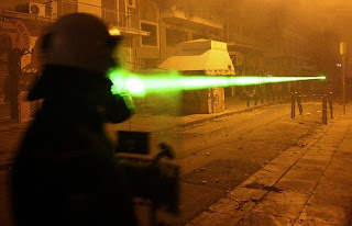 greek protesters unleash the lasers