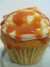 Caramel sauce & vanilla frosting on carrot cupcake