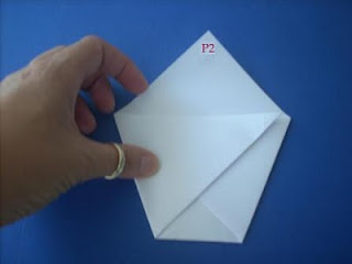 Tutorial coni portariso tecnica dell'origami. 7