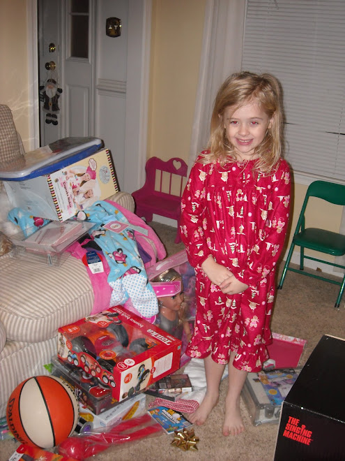 Taylor and her many presents!!!!